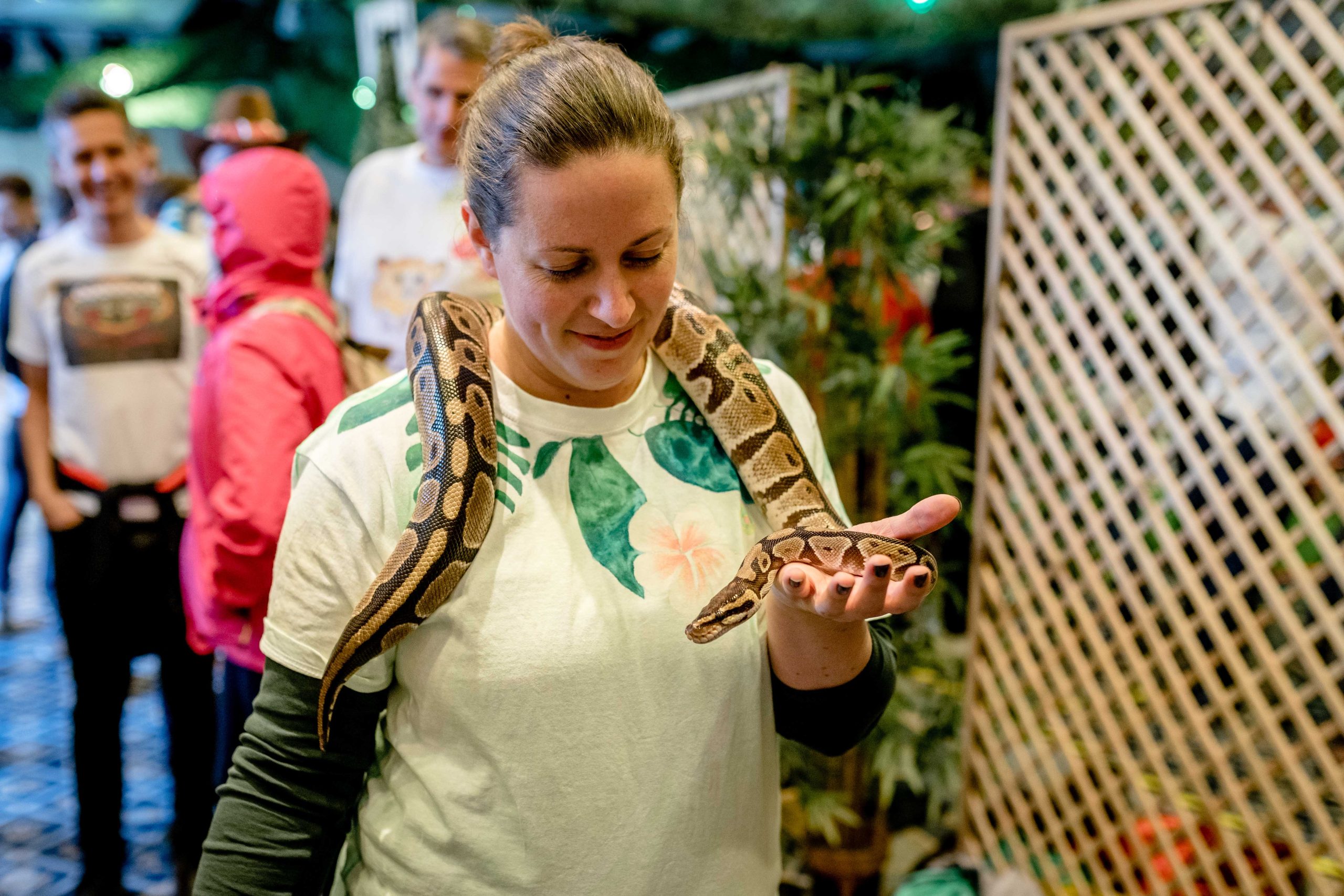 Woman with snake around her neck